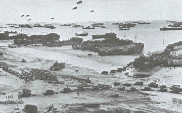 ships unloading at Normandy beach