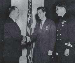 Charles D. Tucker and Frank W. Carey, Jr.are awarded medals